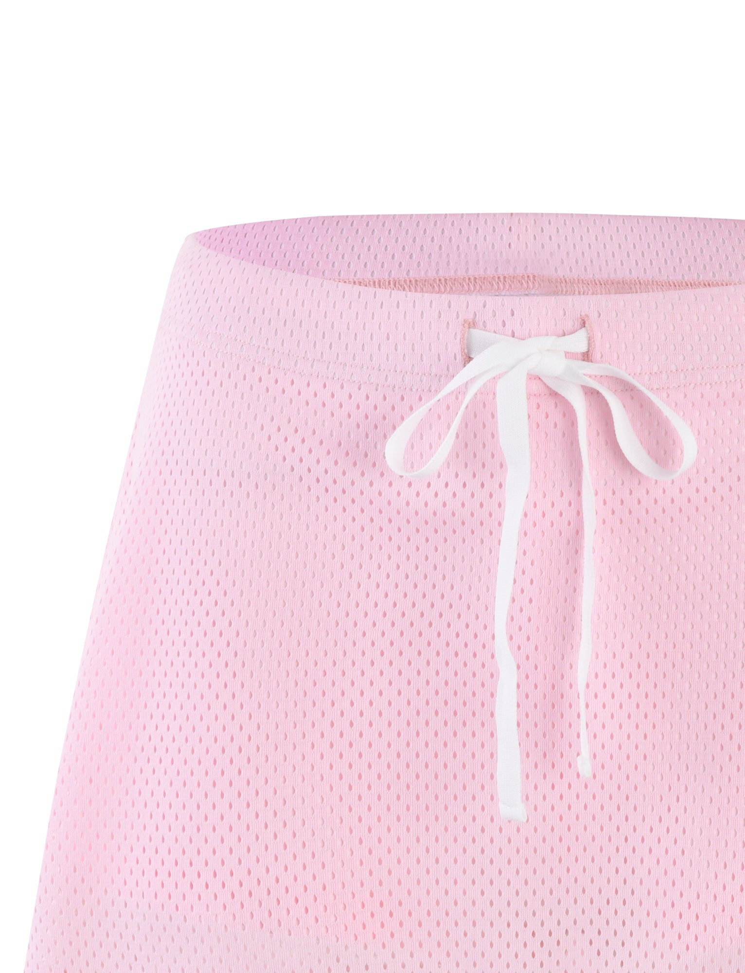 Close-up of the NYDIA SKORT - PINK : BLUSH : DUSTY PINK from TIGERMIST, featuring a light pink mesh fabric with an elastic waistband. The waistband includes a white drawstring tied in a bow at the center front. The coarse, perforated mesh texture gives this skort a casual and sporty appearance.